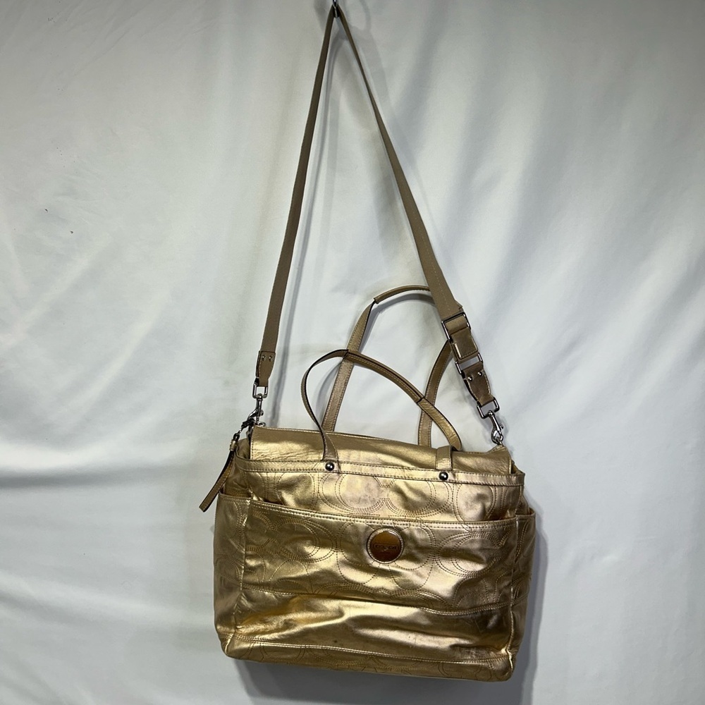 COACH gold oversized diaper bag. Gorgeous. Tons of pockets. Tons of options!